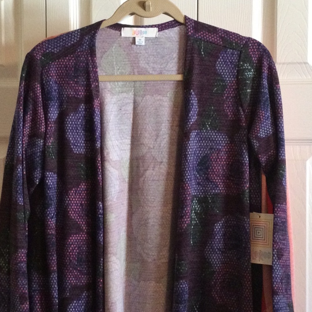 NWT Lularoe Sarah Sweater, size Medium. Digital roses in purple and pink